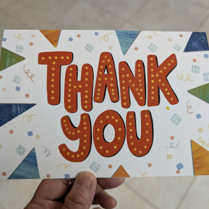 Thank You Greeting Card hand lettered in red and framed by colorful triangles